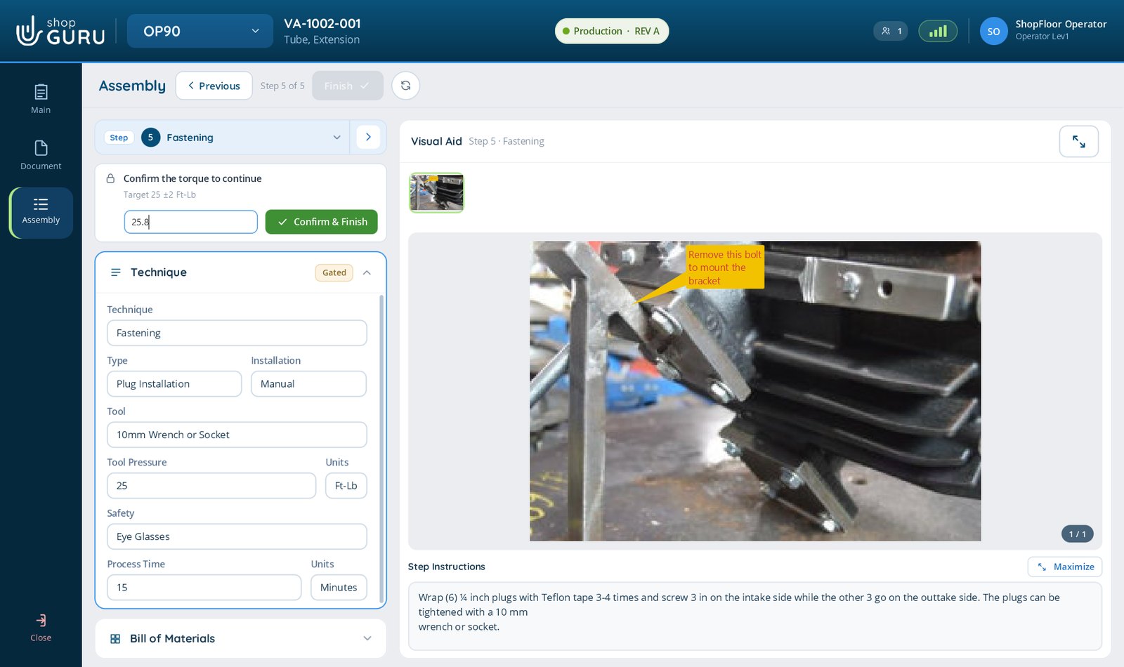 A gated assembly step in shopGURU requiring a torque reading of 25 plus or minus 2 foot pounds before the operator can finish, with a marked-up photo of the bracket